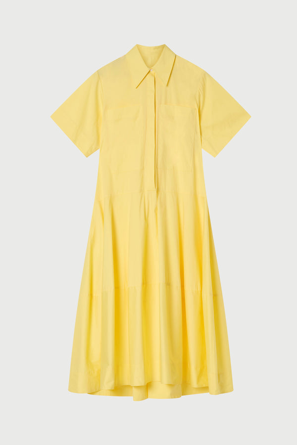 Yellow dress with short sleeves on a light gray background