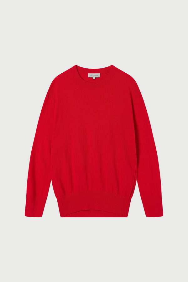 Red sweater on a light gray background