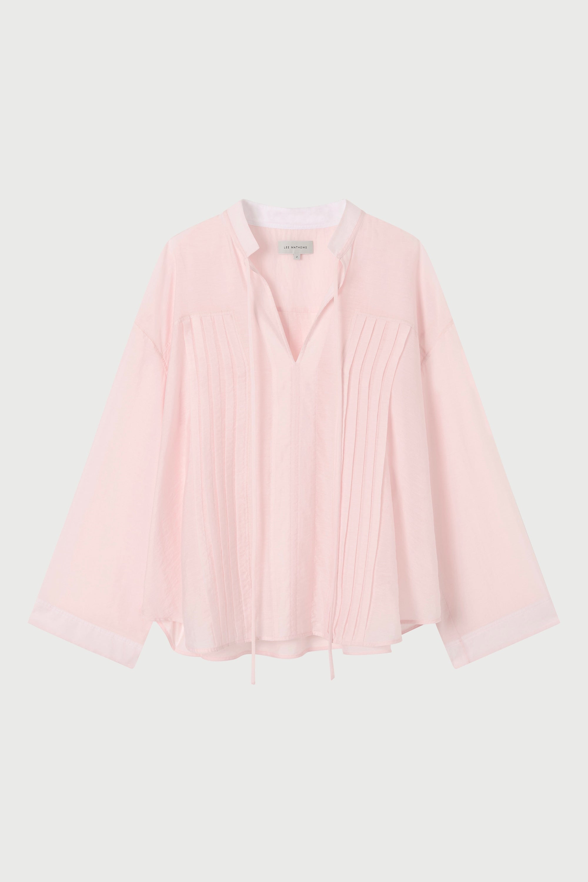  light pink shirt on a white background
