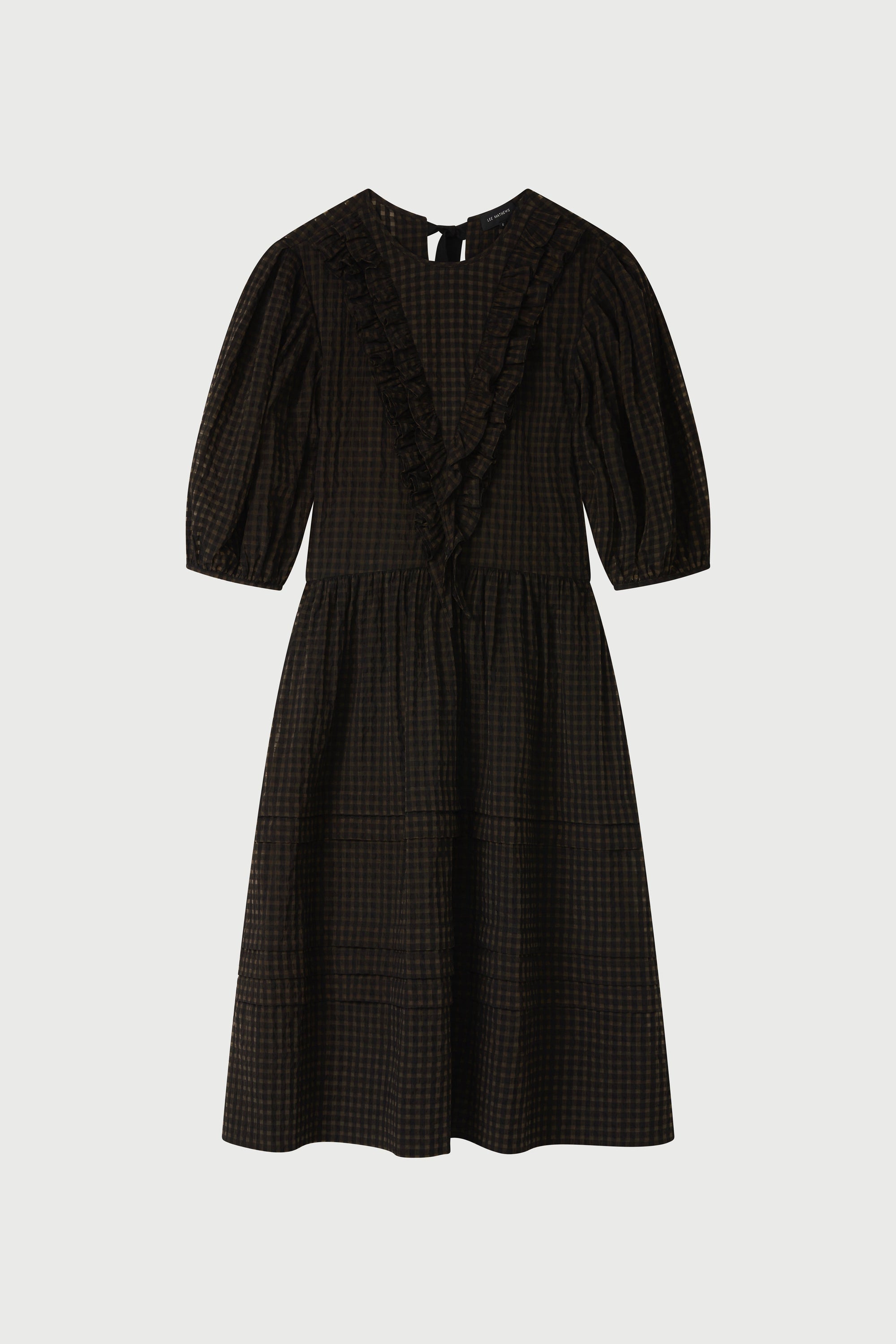 Black checkered dress on a light gray background
