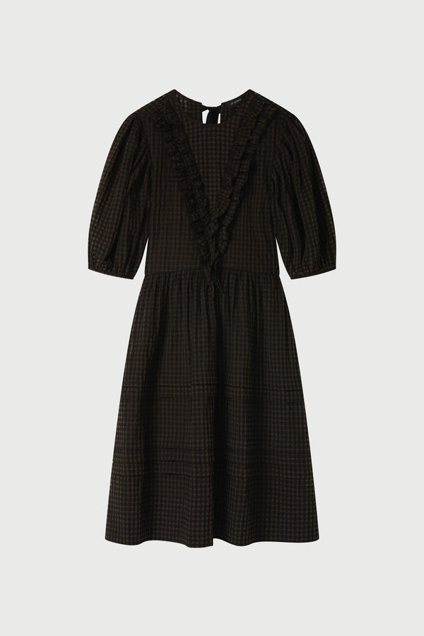 Black checkered dress on a light gray background