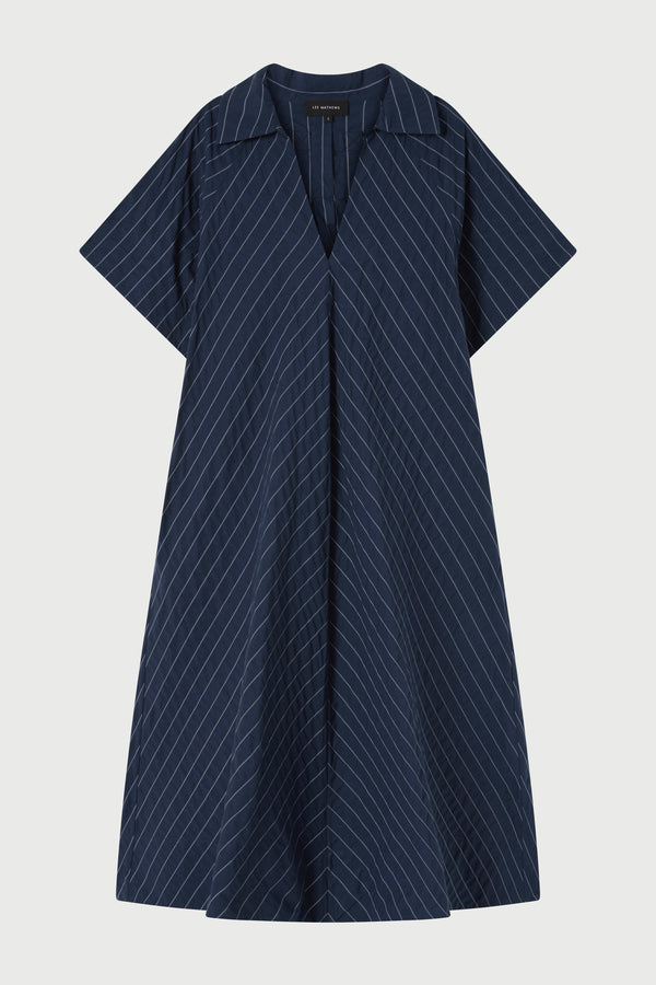 Navy pinstripe dress on a light gray background