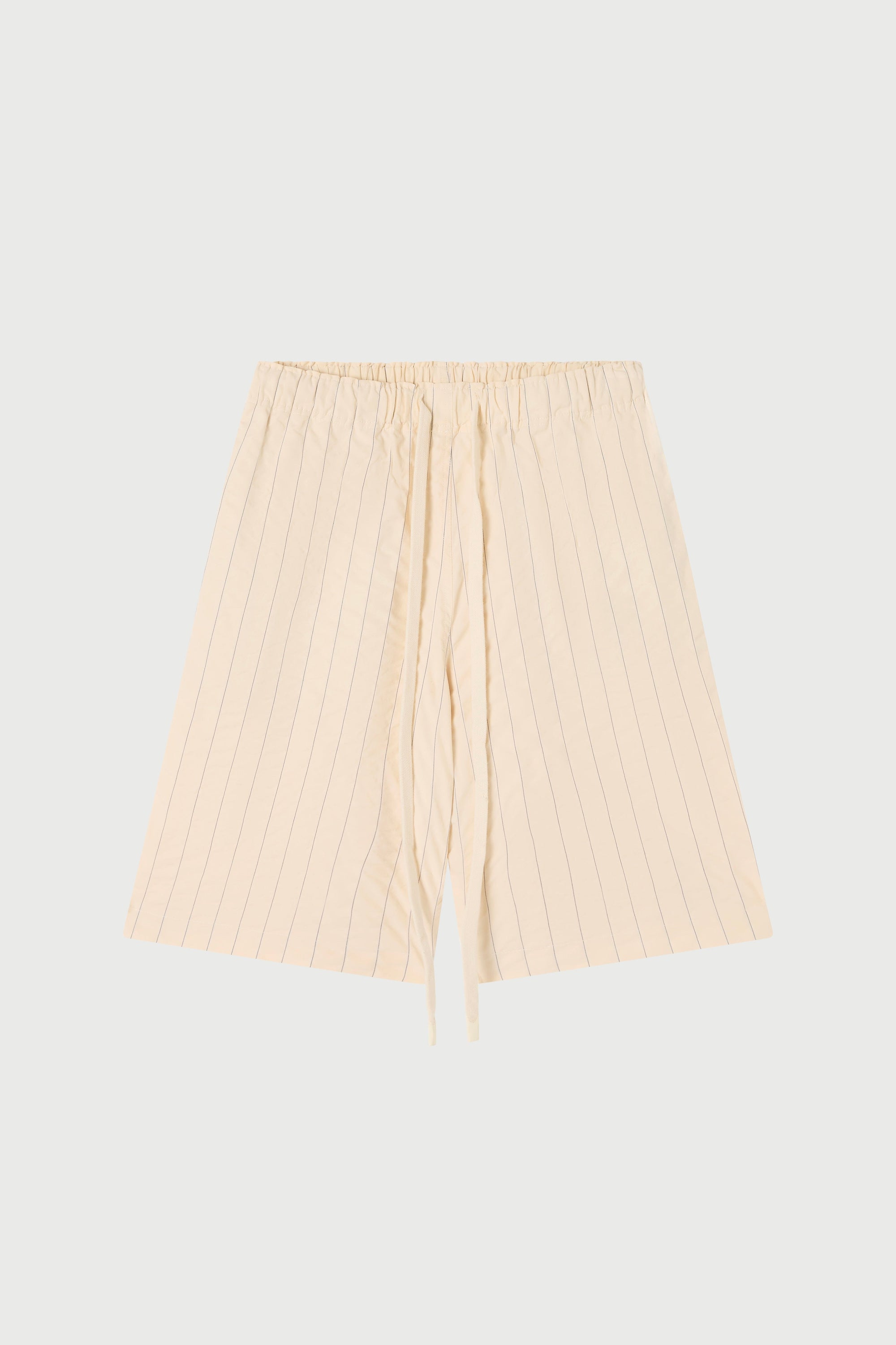 Cream seersucker shorts on a white background