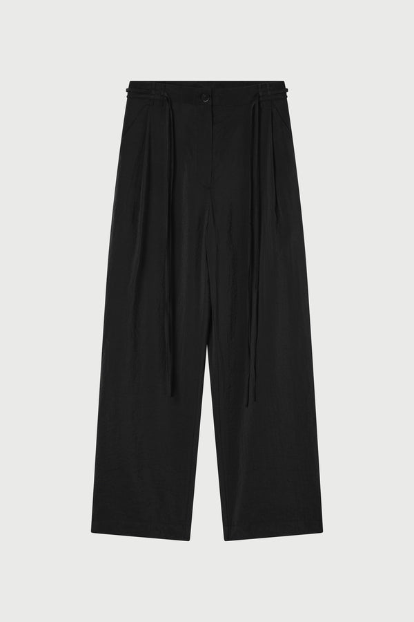 Black pants on a light gray background